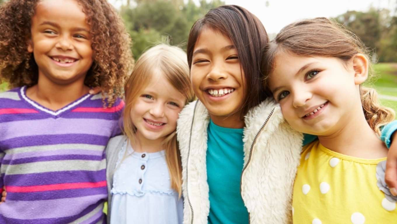 Kids smiling outside