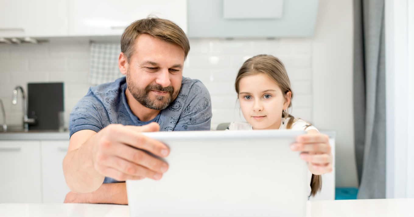 Dad and daughter sharing tablet in kitchen 2026 01 08 07 41 00 utc